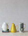 Hand-Painted Stoneware Pitcher with Flower